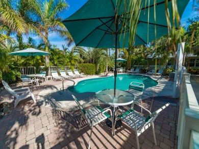 Patio Table & Chairs By Pool